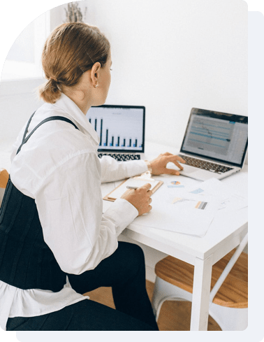 female office worker using a laptop